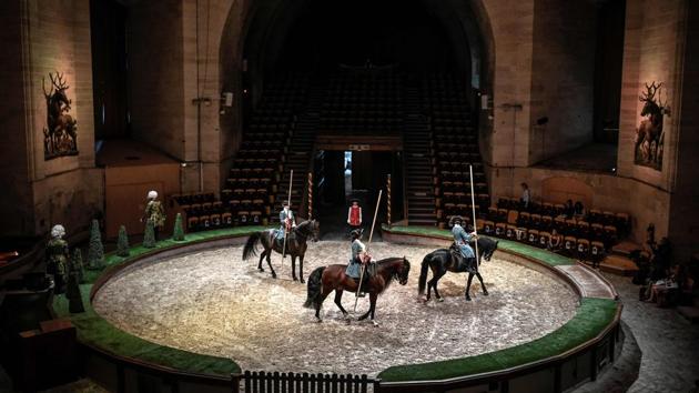 Riders perform during the rehearsal of their show at the Great Stables of Chantilly, north of Paris, France. (Stephane De Sakutin / AFP)