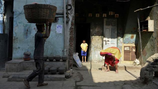 Work will then commence, according to Shah who predicts that all slum dwellers will be rehoused within five years. Residents are still to be convinced though. “We’re not against redevelopment,” said Malik Abdullah, 55, owner of a plastics recycling unit. “But it was us who turned this creek into an industrial powerhouse. If businesses are taken away then we will be left with nothing.” (Punit Paranjpe / AFP)