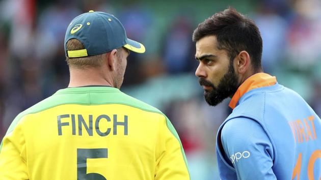 India's captain Virat Kohli, right, talks to Australia's captain Aaron Finch. (AP) India's captain Virat Kohli, right, talks to Australia's captain Aaron Finch. (AP)