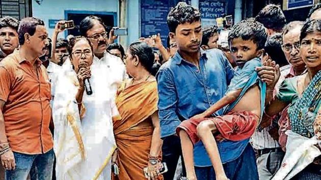 Bengal CM Mamata Banerjee addresses protesting doctors in Kolkata on June 13. The protests turned into a crisis for the Trinamool administration.(HT File)