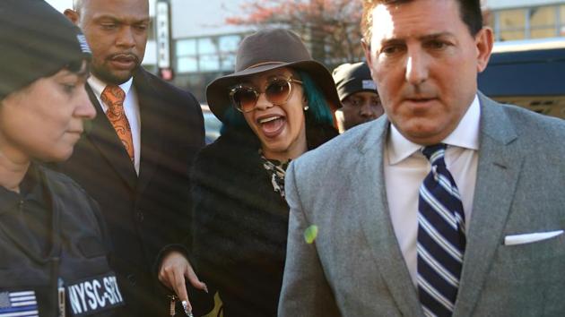 (FILES) In this file photo taken on December 07, 2018, Rapper Cardi B, whose real name is Belcalis Almanzar, arrives at Queens County Court to face charges stemming from a strip club fight in Queens (AFP) (FILES) In this file photo taken on December 07, 2018, Rapper Cardi B, whose real name is Belcalis Almanzar, arrives at Queens County Court to face charges stemming from a strip club fight in Queens (AFP)