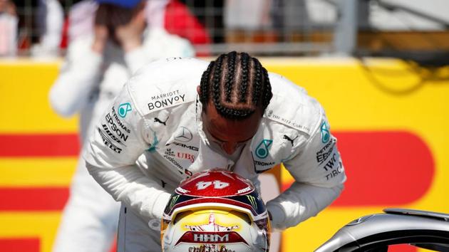 Mercedes' Lewis Hamilton celebrates pole after qualifying.(REUTERS)