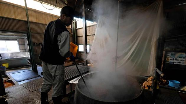 A worker boiling kozo plants at the beginning of the papermaking process at the Hidaka Washi factory. Chinzei’s product, the world’s thinnest paper, has helped save historical documents at major museums and libraries -- including the Louvre in Paris, the British Museum and Washington’s Library of Congress -- from decay. “Washi paper is more flexible and durable” than what Japanese refer to as “western paper”, which disintegrates into tiny pieces when it becomes very old, Chinzei said. (Kazuhiro NOGI / AFP)
