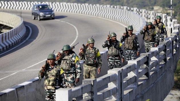 Central Reserve Police Force (CRPF) soldiers patrol the Jammu & Kashmir National Highway ahead of the upcoming Amarnath Yatra, in Jammu district. The 46-day-long Amarnath Yatra will begin on July 1 and would conclude on August 15. (PTI)