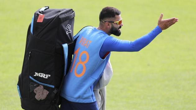 India's captain Virat Kohli gestures to his teammates as he walks to bat in the nets during a training session ahead of their Cricket World Cup match against Afghanistan at the Hampshire Bowl in Southampton, England, Thursday, June 20, 2019. (AP) India's captain Virat Kohli gestures to his teammates as he walks to bat in the nets during a training session ahead of their Cricket World Cup match against Afghanistan at the Hampshire Bowl in Southampton, England, Thursday, June 20, 2019. (AP)