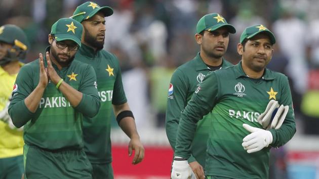 Pakistan's captain Sarfaraz Ahmed right leads the team from the field. (AP)