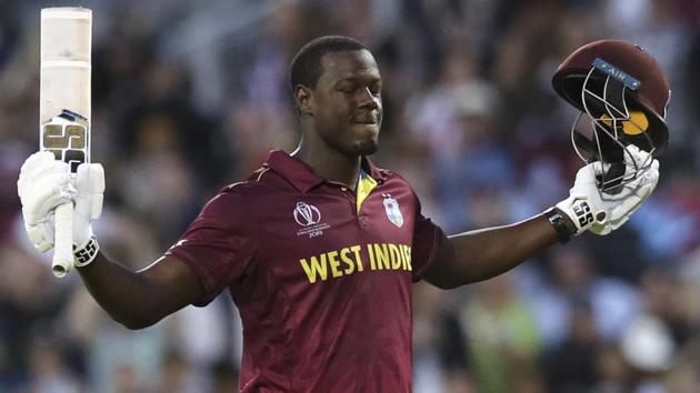 West Indies' Carlos Brathwaite celebrates after scoring a century.(AP)