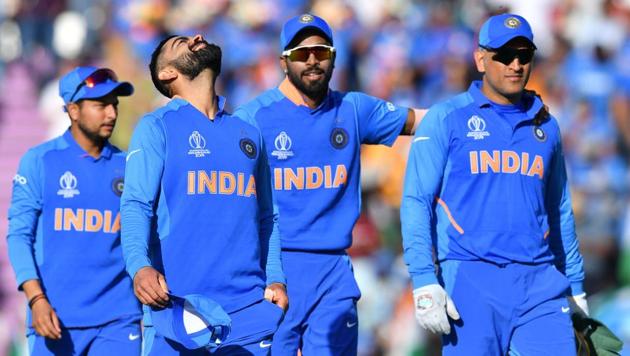India's captain Virat Kohli (2L) celebrates with teammates Kuldeep Yadav (L) India's Hardik Pandya (2R) and Mahendra Singh Dhoni (R) after victory in the 2019 Cricket World Cup group stage match between India and Afghanistan at the Rose Bowl in Southampton, southern England, on June 22, 2019(AFP)