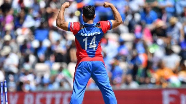 Afghanistan's captain Gulbadin Naib celebrates after the dismissal of India's Mohammed Shami. (AFP)