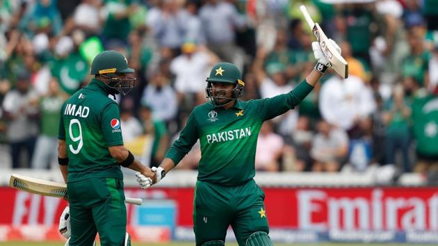 Pakistan's Haris Sohail (R) celebrates with teammate Pakistan's Imad Wasim after scoring a half-century. (AFP)