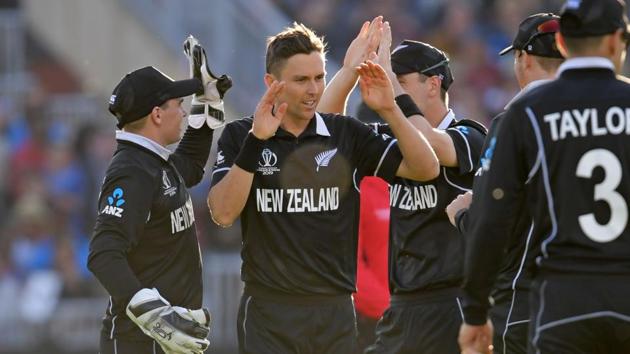 New Zealand's Trent Boult (C) celebrates with teammates after taking the wicket of West Indies' Ashley Nurse during the 2019 Cricket World Cup group stage match between West Indies and New Zealand at Old Trafford in Manchester, northwest England, on June 22, 2019 (AFP)