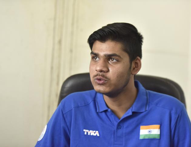Shooter Divyansh Panwar during an interview at National Rifle Association of India office.(Sanjeev Verma/HT PHOTO)