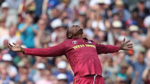 West Indies' Sheldon Cottrell celebrates taking the wicket of New Zealand's Tom Latham (Action Images via Reuters)