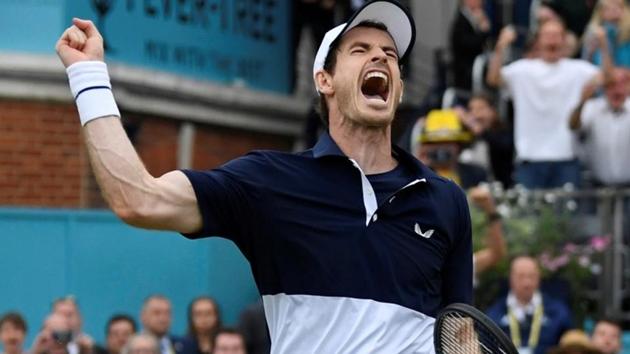 Andy Murray celebrates winning his doubles final match.(Action Images via Reuters)