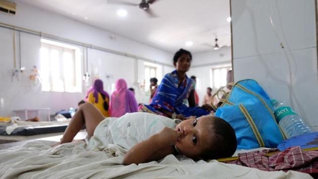 A child suffering from acute encephalitis syndrome lies on a bed at a hospital in Muzaffarpur, Bihar. (Reuters) A child suffering from acute encephalitis syndrome lies on a bed at a hospital in Muzaffarpur, Bihar. (Reuters)