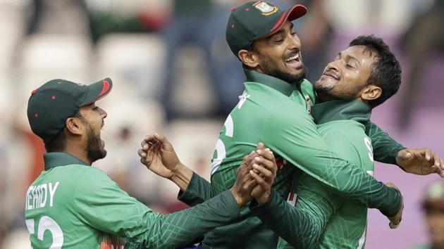 Bangladesh's Shakib Al Hasan, right, celebrates taking the wicket of Afghanistan's Mohammad Nabi. (AP)