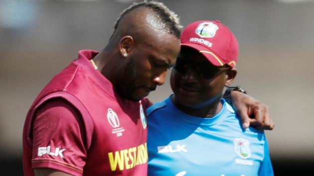 West Indies Andre Russell goes off injured.(Action Images via Reuters)