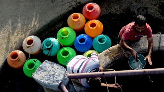More than half of India is reeling from drought-like conditions, the India Meteorological Department’s (IMD) latest data shows, with millions struggling for drinking water as lakes dry up and groundwater levels deplete amid a sluggish monsoon that, as per the agriculture ministry, has impacted the sowing of key summer crops. According to IMD, the monsoon was 39% deficient till June 22 despite marginal improvement over the last week. (Arun Sankar / AFP)