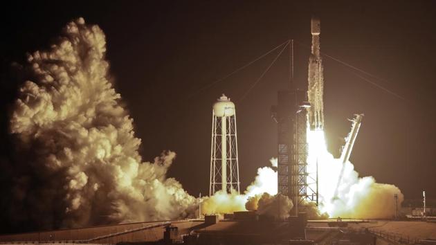 SpaceX launched its Falcon Heavy rocket on Tuesday from Kennedy Space Center in Florida, carrying 24 experimental satellites in what Elon Musk’s rocket company called one of the most difficult launches it has attempted.(AP Photo)