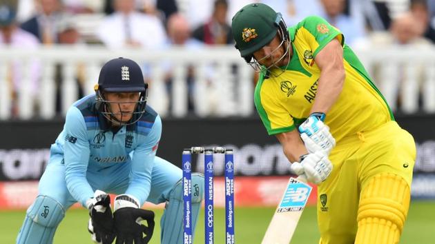Australia's captain Aaron Finch (R) plays a shot. (AFP)