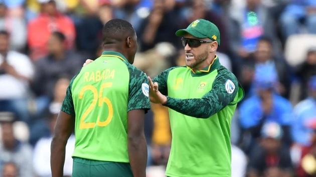 South Africa's Kagiso Rabada (L) celebrates with South Africa's captain Faf du Plessis after taking the wicket of India's Shikhar Dhawan for eight during the 2019 Cricket World Cup group stage match between South Africa and India at the Rose Bowl in Southampton, southern England, on June 5, 2019. (AFP) South Africa's Kagiso Rabada (L) celebrates with South Africa's captain Faf du Plessis after taking the wicket of India's Shikhar Dhawan for eight during the 2019 Cricket World Cup group stage match between South Africa and India at the Rose Bowl in Southampton, southern England, on June 5, 2019. (AFP)