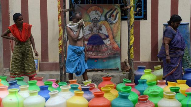 The desperation has spilled over into clashes in Chennai. One woman who was involved in a water dispute with neighbours was stabbed in the neck. In another suffering city, Thanjavur, an activist was beaten to death by a neighbouring family after he accused them of hoarding water. Many in Chennai do not have the money to pay for extra supplies, and arguments in queues for free water often turn violent. (Arun Sankar / AFP) The desperation has spilled over into clashes in Chennai. One woman who was involved in a water dispute with neighbours was stabbed in the neck. In another suffering city, Thanjavur, an activist was beaten to death by a neighbouring family after he accused them of hoarding water. Many in Chennai do not have the money to pay for extra supplies, and arguments in queues for free water often turn violent. (Arun Sankar / AFP)