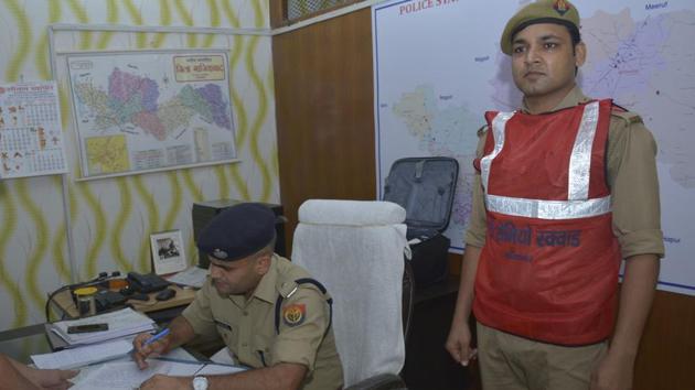 A Ghaziabad police personnel seen wearing special anti-romeo squad jacket, June 24, 2019.Pink letters boxes will also be put up at schools and colleges for women and minors to anonymously drop in their complaints to police without revealing their identities.(Sakib Ali / HT Photo)