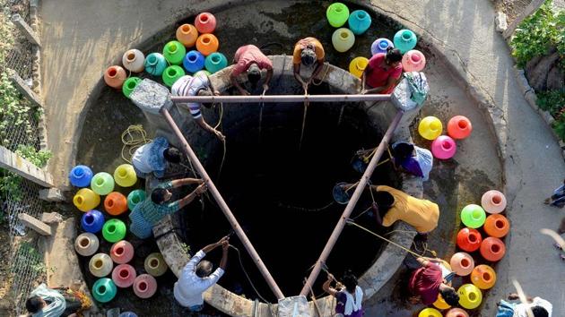 Residents get water from a community well in Chennai after reservoirs for the city ran dry. The bustling capital of Tamil Nadu state usually receives 825 million litres of water a day, but authorities are currently only able to supply 60% of that. With temperatures regularly hitting 40 degrees Celsius, reservoirs have run dry and other water sources are dwindling each day. (Arun Sankar / AFP) Residents get water from a community well in Chennai after reservoirs for the city ran dry. The bustling capital of Tamil Nadu state usually receives 825 million litres of water a day, but authorities are currently only able to supply 60% of that. With temperatures regularly hitting 40 degrees Celsius, reservoirs have run dry and other water sources are dwindling each day. (Arun Sankar / AFP)