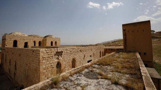 Other relics of the British era survive. Buildings constructed during the British Mandate era to serve as jails and fortified positions stand in Al-Jiftlik village near Jericho, in the West Bank. Long abandoned, sheep now wander through, searching for vegetation in the scorching heat of the Jordan Valley. The Israeli military sometimes uses them for training, Palestinian residents say. (Mohamad Torokman / REUTERS) Other relics of the British era survive. Buildings constructed during the British Mandate era to serve as jails and fortified positions stand in Al-Jiftlik village near Jericho, in the West Bank. Long abandoned, sheep now wander through, searching for vegetation in the scorching heat of the Jordan Valley. The Israeli military sometimes uses them for training, Palestinian residents say. (Mohamad Torokman / REUTERS)