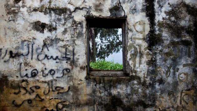 Across the Golan are other reminders of the 1967 and 1973 wars between Israel and Syria: minefields, foxholes and abandoned armour. One former Syrian building, crumbling and covered in graffiti, has this Arabic message reading: "The Syrian army passed by here." It is not the only army to have passed through. The British army arrived in 1917 and left in 1948. (Ronen Zvulun / REUTERS) Across the Golan are other reminders of the 1967 and 1973 wars between Israel and Syria: minefields, foxholes and abandoned armour. One former Syrian building, crumbling and covered in graffiti, has this Arabic message reading: "The Syrian army passed by here." It is not the only army to have passed through. The British army arrived in 1917 and left in 1948. (Ronen Zvulun / REUTERS)