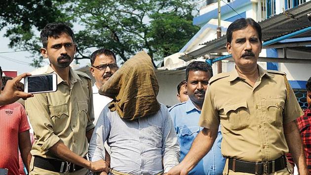 Kamruzzaman Sarkar, the 37-year-old suspected serial killer, is brought to the Kalna court for hearing, at Kalna, in East Burdwan district of West Bengal, India. (Photo Samir Jana / Hindustan Times)