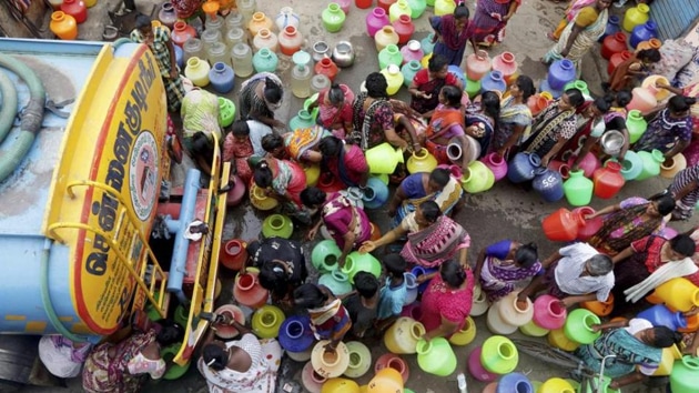 Indians stand in queues to fill vessels with drinking water from a water tanker in Chennai, capital of the southern Indian state of Tamil Nadu.(AP file photo)