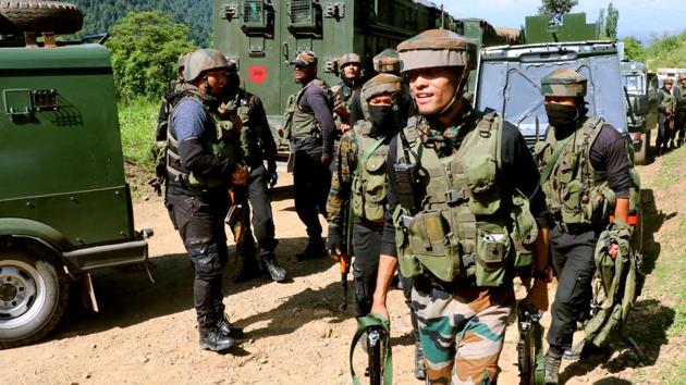 Army jawans walk towards encounter site at Branpatri, a forest area of Tral in Pulwama, on June 26, 2019. (ANI Photo) Army jawans walk towards encounter site at Branpatri, a forest area of Tral in Pulwama, on June 26, 2019. (ANI Photo)