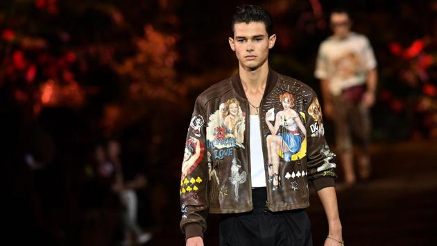 A model presents a creation for fashion house Dolce & Gabbana during the presentation of its men's spring/summer 2020 fashion collection in Milan on June 15, 2019. (Photo by Marco Bertorello / AFP)(AFP)