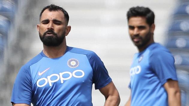 India's Bhuvneshwar Kumar, right, watches fellow bowler Mohammed Shami bowl during a training session. (AP) India's Bhuvneshwar Kumar, right, watches fellow bowler Mohammed Shami bowl during a training session. (AP)