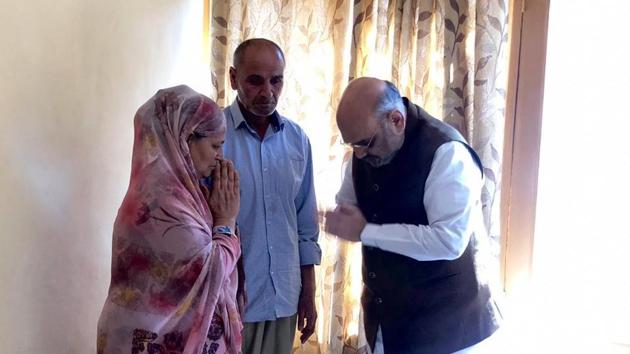 Home Minister Amit Shah Thursday visited the family of Jammu and Kashmir Police inspector Arshad Ahmed Khan, who was killed in a terror attack in Anantnag on June 12.(ANI/Twitter)