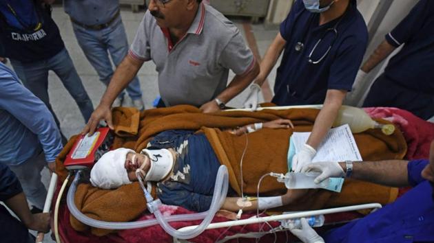An injured person is carried on a stretcher at a hospital in Srinagar,India, on June 27, 2019.(Waseem Andrabi/ Hindustan Times) An injured person is carried on a stretcher at a hospital in Srinagar,India, on June 27, 2019.(Waseem Andrabi/ Hindustan Times)