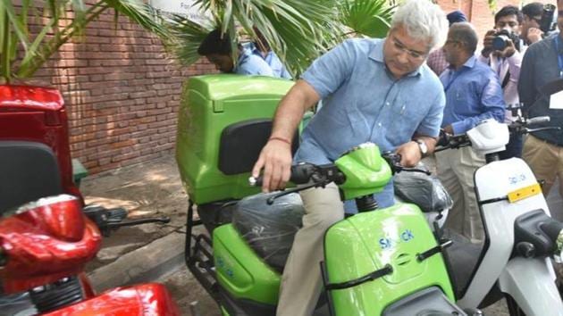 Transport Minister of Delhi Kailash Gahlot seen checking an electric motor bike during the inauguration of the Urban Mobility Lab workshop and launch of a pilot project, at India Habitat Centre (Sushil Kumar / Hindustan Times) Transport Minister of Delhi Kailash Gahlot seen checking an electric motor bike during the inauguration of the Urban Mobility Lab workshop and launch of a pilot project, at India Habitat Centre (Sushil Kumar / Hindustan Times)