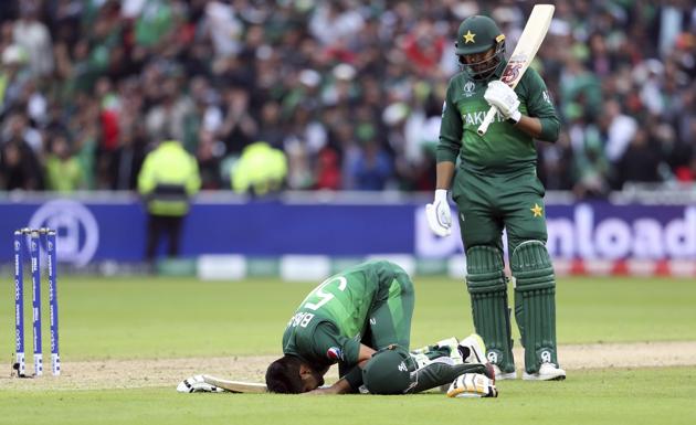 Birmingham: Pakistan's batsman Babar Azam, left, bows down as teammate Haris Sohail watches on after scoring a century. (AP) Birmingham: Pakistan's batsman Babar Azam, left, bows down as teammate Haris Sohail watches on after scoring a century. (AP)