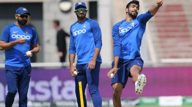 India's Jasprit Bumrah (R) bowls as teammates Vijay Shankar (C) and Mohammed Shami (L) look on. (AFP) India's Jasprit Bumrah (R) bowls as teammates Vijay Shankar (C) and Mohammed Shami (L) look on. (AFP)