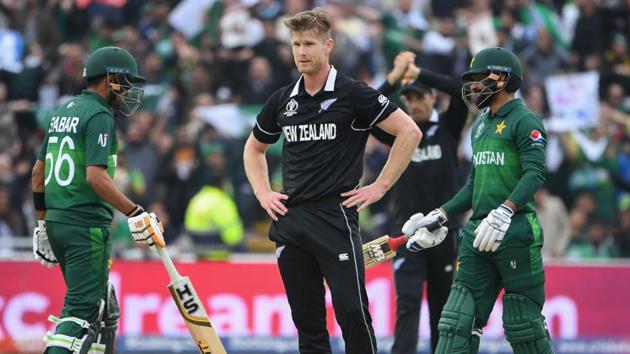 New Zealand's James Neesham (C) reacts after being hit for a boundary.(AFP)