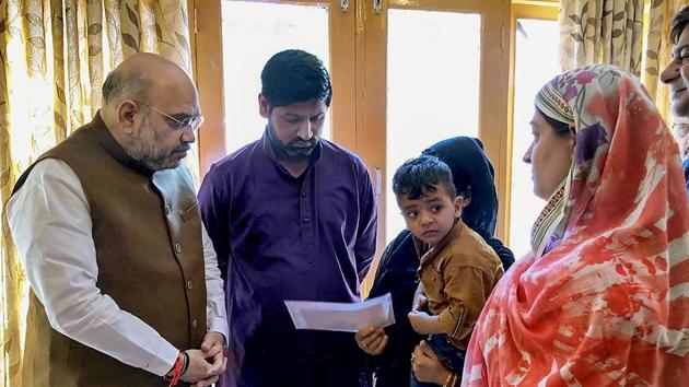 Home Minister Amit Shah Thursday visited the family of Jammu and Kashmir Police inspector Arshad Ahmed Khan, who was killed in a terror attack in Anantnag on June 12. Khan, 37, was injured in the terror attack and later flown to Delhi in an air ambulance for specialised treatment. However, he succumbed to injuries at the All India Institute of Medical Sciences (AIIMS) (PTI)