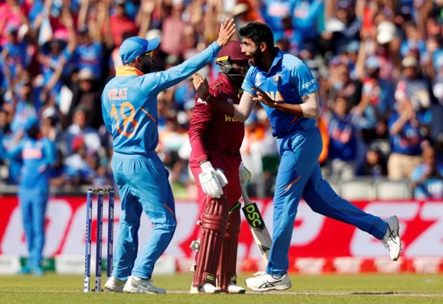 India's Jasprit Bumrah celebrates with Virat Kohli after dismissing West Indies' Fabian Allen (Action Images via Reuters)