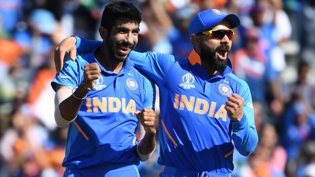 Jasprit Bumrah (L) celebrates with Virat Kohli during their ICC World Cup 2019 encounter against West Indies. (AFP) Jasprit Bumrah (L) celebrates with Virat Kohli during their ICC World Cup 2019 encounter against West Indies. (AFP)