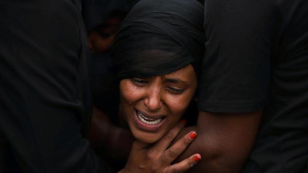 A relative mourns during the funeral ceremony of Ethiopian Army Chief of Staff, Seare Mekonnen who was killed by his bodyguard, in Mekele,Tigray Region, Ethiopia June 26, 2019. (Tiksa Negeri / REUTERS) A relative mourns during the funeral ceremony of Ethiopian Army Chief of Staff, Seare Mekonnen who was killed by his bodyguard, in Mekele,Tigray Region, Ethiopia June 26, 2019. (Tiksa Negeri / REUTERS)
