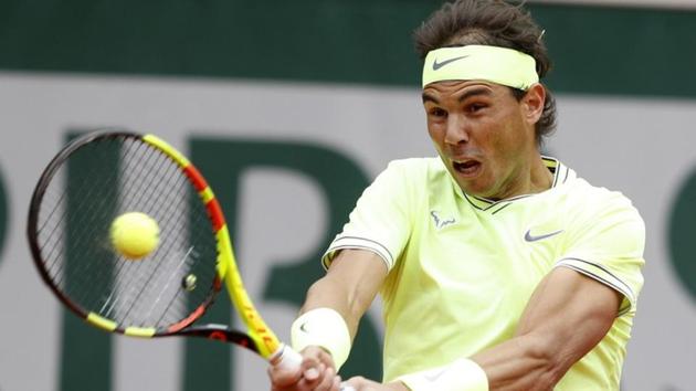 Spain's Rafael Nadal in action against Roger Federer.(REUTERS)