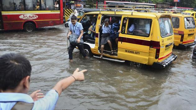 Mumbai woke up to moderate spells of rain and isolated heavy showers across the Mumbai Metropolitan Region (MMR) on Friday, bringing relief from hot and humid conditions. The rains brought traffic to a halt in several areas of Mumbai, with authorities putting diversions on many roads adding to the chaos. (PTI) Mumbai woke up to moderate spells of rain and isolated heavy showers across the Mumbai Metropolitan Region (MMR) on Friday, bringing relief from hot and humid conditions. The rains brought traffic to a halt in several areas of Mumbai, with authorities putting diversions on many roads adding to the chaos. (PTI)
