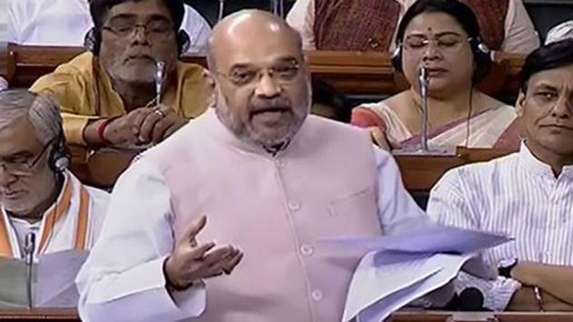 Union Home Minister Amit Shah speaks in the Lok Sabha during the Budget Session of Parliament in New Delhi on Friday. (PTI PHOTO.) Union Home Minister Amit Shah speaks in the Lok Sabha during the Budget Session of Parliament in New Delhi on Friday. (PTI PHOTO.)