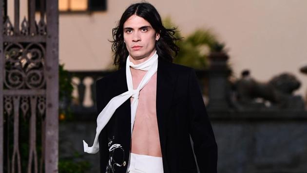 A model presents a creation during the presentation of French luxury fashion house Givenchy's new menswear collection, as Guest Designer of the Pitti Immagine Uomo fashion event on June 12, 2019 at Villa Palmieri in Fiesole, near Florence, Tuscany. (Photo by Miguel MEDINA / AFP)(AFP)