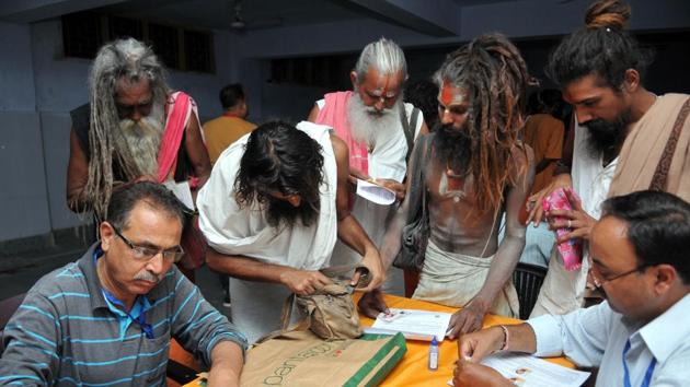 Sadhus register for a pilgrimage on the first day of registration for Amarnath Yatra at Ram Mandir Base Camp, in Jammu, Jammu and Kashmir. The 40-day pilgrimage to the cave shrine at an altitude of 3,880 metre in the south Kashmir Himalayas will commence from July 1. (Nitin Kanotra / HT Photo) Sadhus register for a pilgrimage on the first day of registration for Amarnath Yatra at Ram Mandir Base Camp, in Jammu, Jammu and Kashmir. The 40-day pilgrimage to the cave shrine at an altitude of 3,880 metre in the south Kashmir Himalayas will commence from July 1. (Nitin Kanotra / HT Photo)